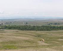 T00_2533 Last Stand Trail - Little Bighorn slagveld met zicht op de gronden van Crown Agency, het indiaans reservaat rond het slagveld en monument.